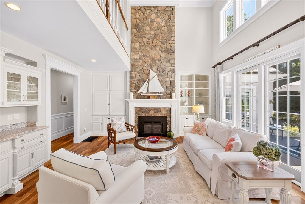 Fireplace, Interior, Living room, Recessed Lighting, Stone Walls, Wood Texture Flooring