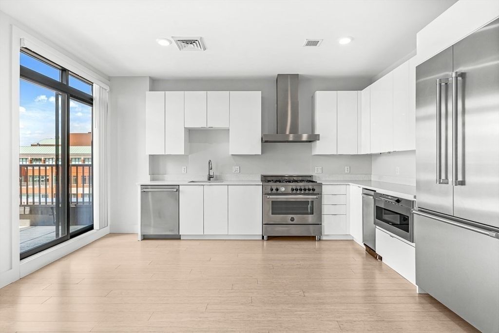 Interior, Kitchen, Recessed Lighting, Stainless Steel Appliances, Wood Texture Flooring
