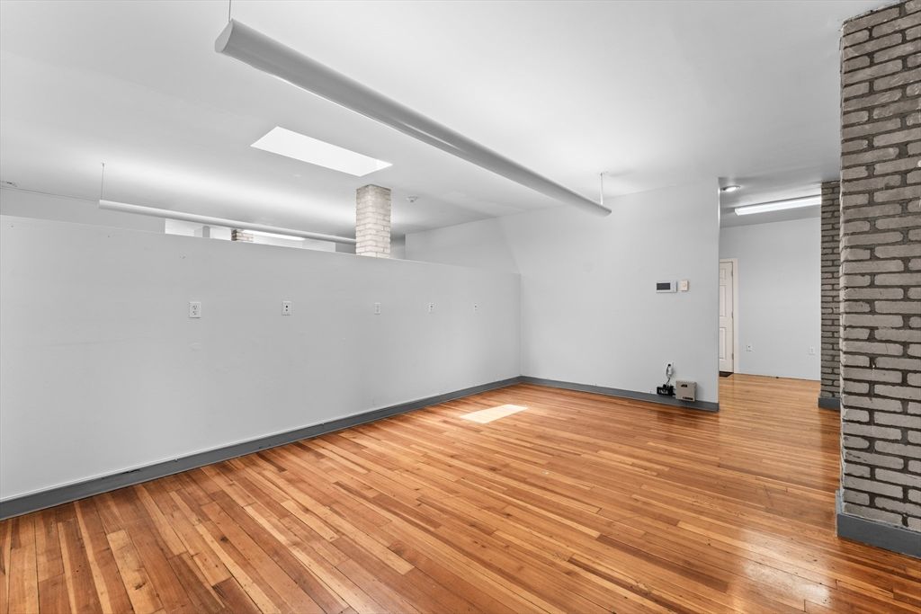 Empty room, Interior, Recessed Lighting, Stone Walls, Wood Texture Flooring