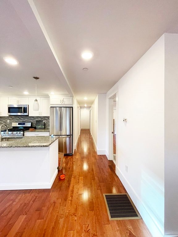 Interior, Kitchen, Pendant Lights, Recessed Lighting, Stainless Steel Appliances, Wood Texture Flooring