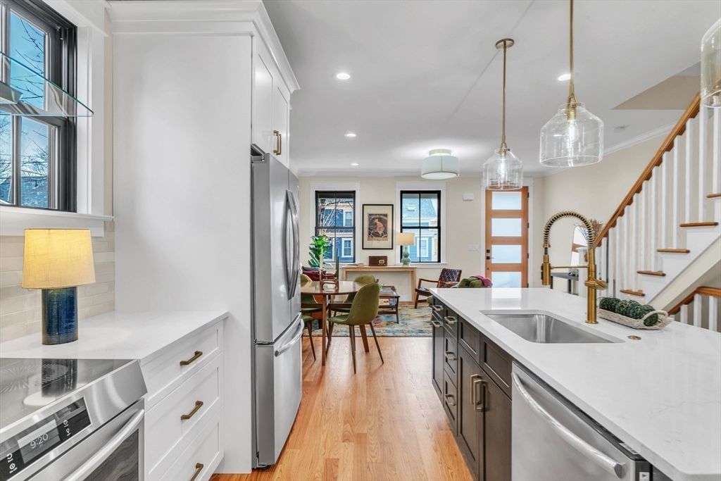 Dining room, Interior, Kitchen, Pendant Lights, Recessed Lighting, Stainless Steel Appliances, Wood Texture Flooring