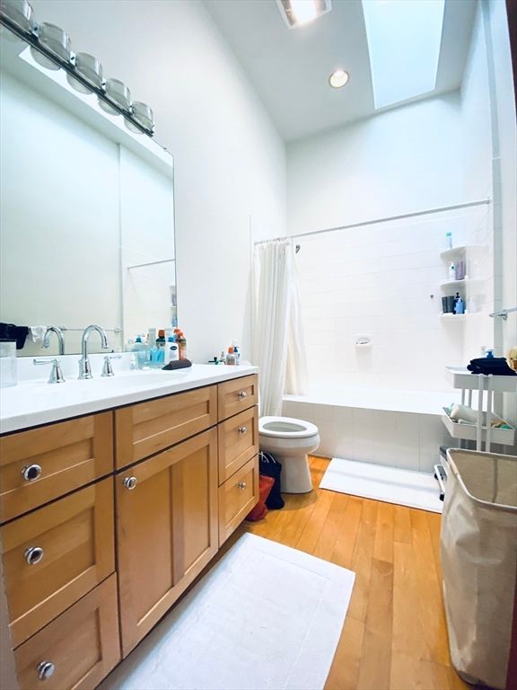 Bathroom, Dual Sink Vanities, Interior, Recessed Lighting, Wood Texture Flooring