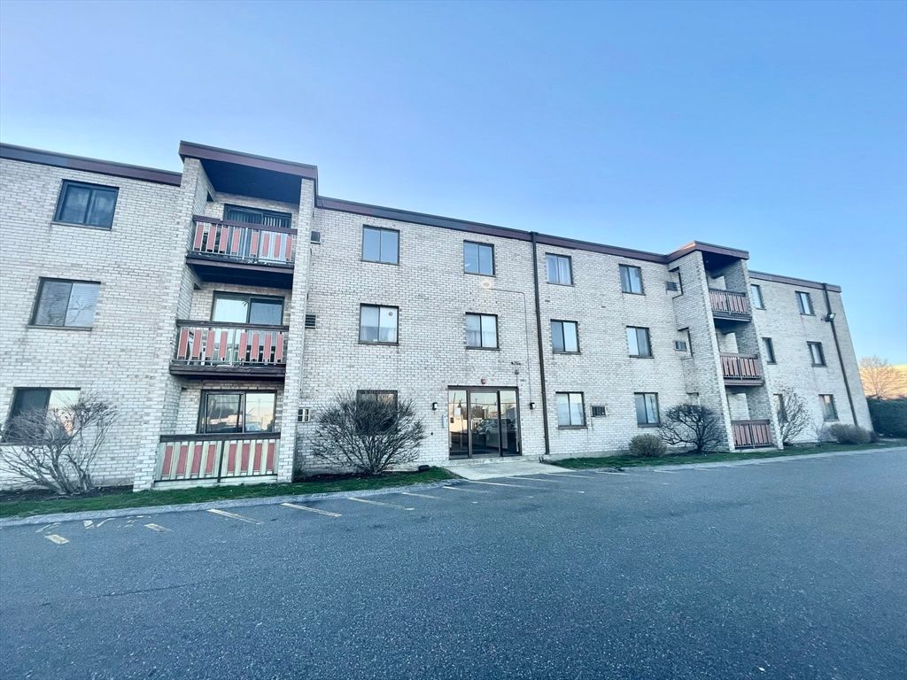 Exterior, Facade, Brick Facade, Condo Building