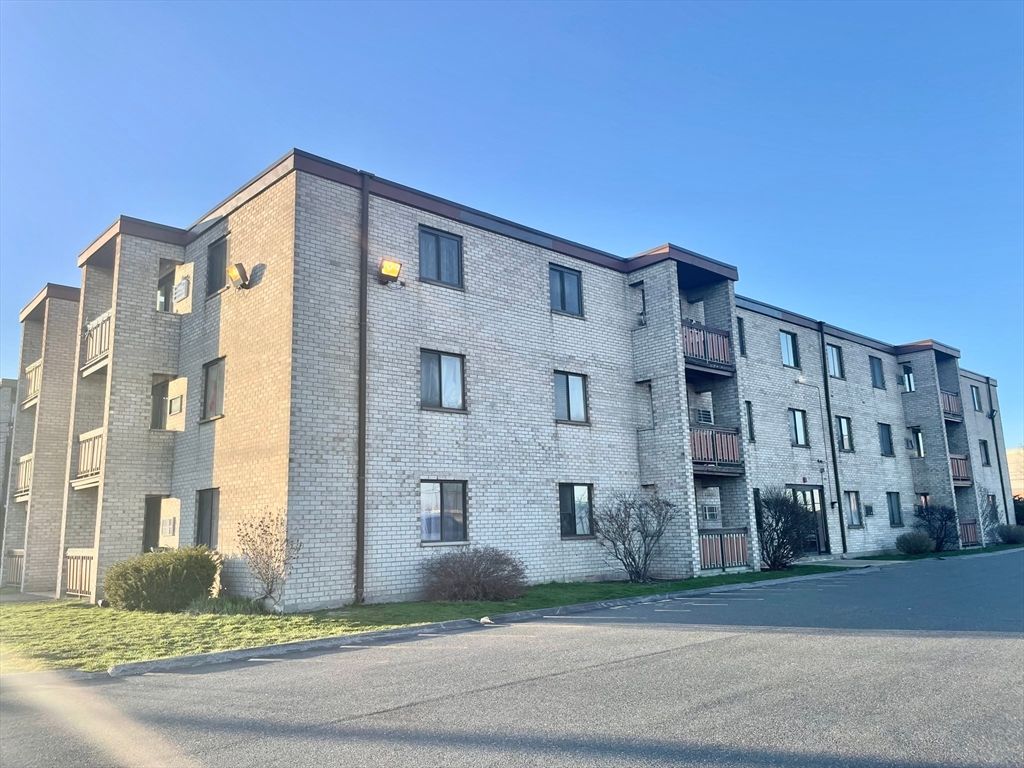 Exterior, Facade, Brick Facade, Condo Building