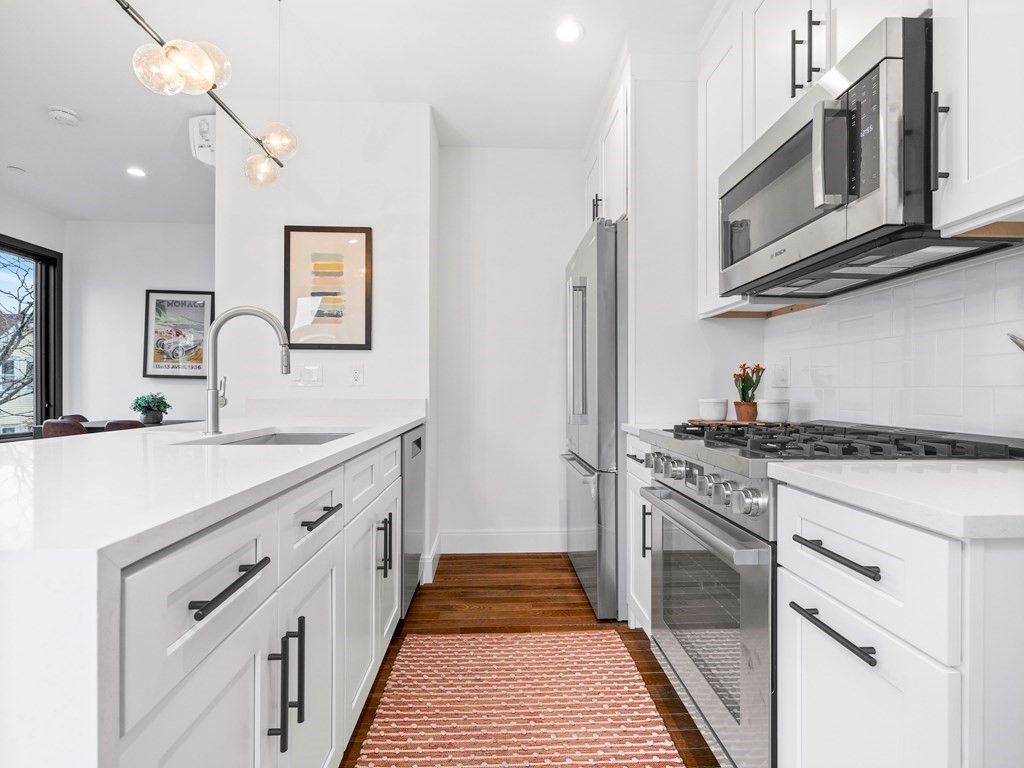 Interior, Kitchen, Pendant Lights, Recessed Lighting, Stainless Steel Appliances, Wood Texture Flooring