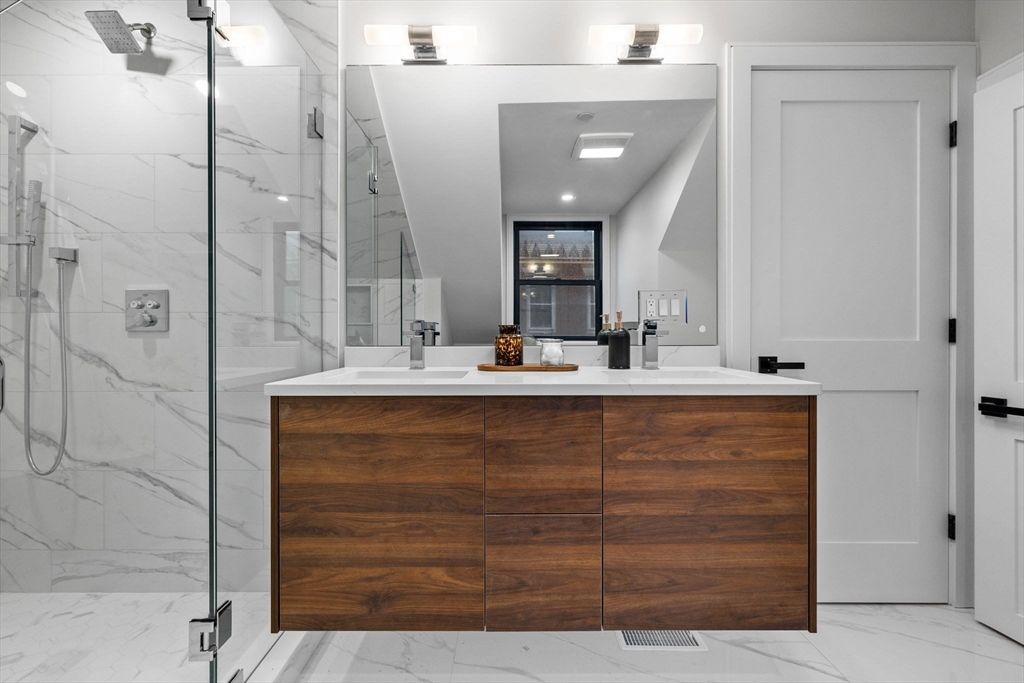 Bathroom, Dual Sink Vanities, Glass Shower, Interior, Marble, Marble Walls, Recessed Lighting