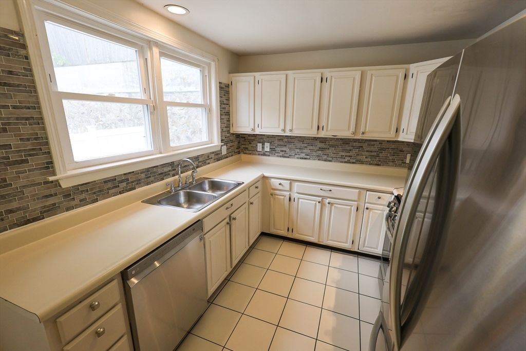 Interior, Kitchen, Recessed Lighting, Stainless Steel Appliances, Stone Walls