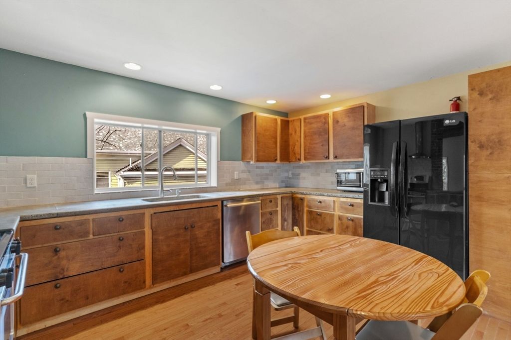 Dining room, Interior, Kitchen, Recessed Lighting, Stainless Steel Appliances, Wood Texture Flooring