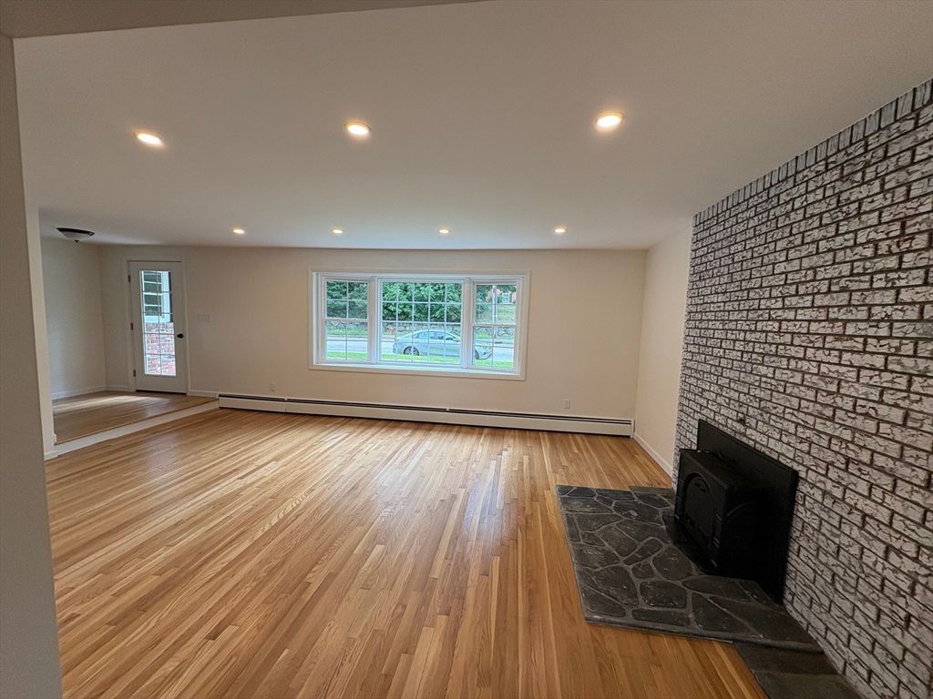 Empty room, Fireplace, Interior, Recessed Lighting, Wood Texture Flooring
