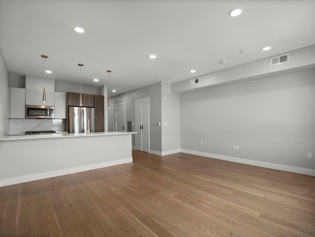 Interior, Kitchen, Pendant Lights, Recessed Lighting, Stainless Steel Appliances, Wood Texture Flooring
