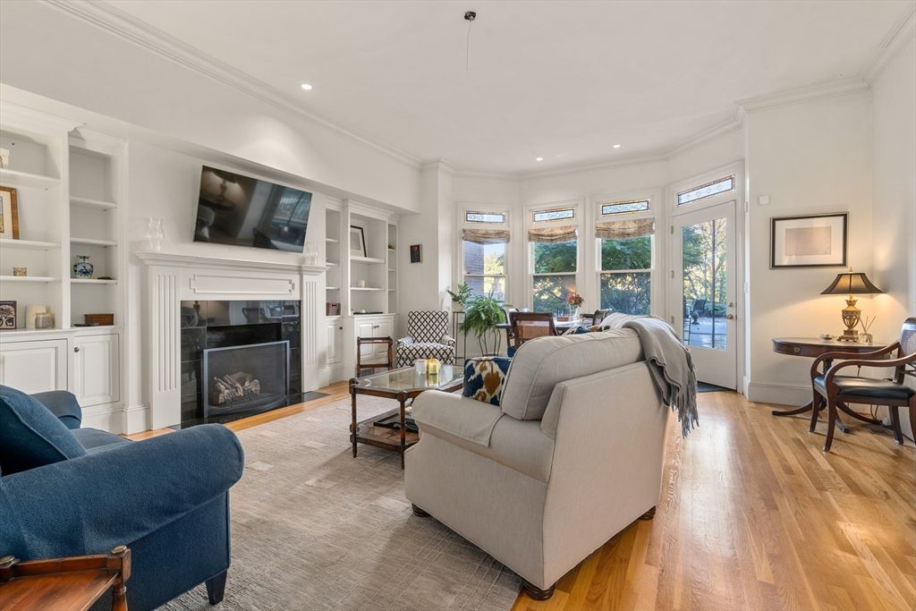 Dining room, Fireplace, Interior, Living room, Recessed Lighting, Wood Texture Flooring