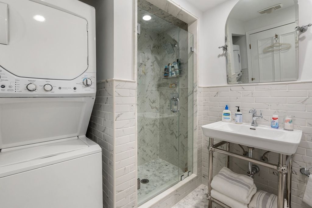 Bathroom, Glass Shower, Interior, Marble Walls, Recessed Lighting, Utility Closets, Washer