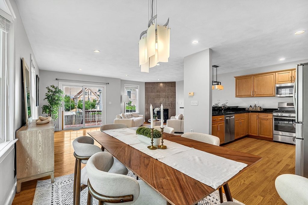 Dining room, Interior, Kitchen, Living room, Pendant Lights, Recessed Lighting, Stainless Steel Appliances, Wood Texture Flooring
