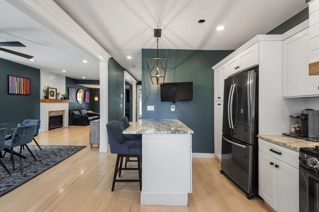 Fireplace, Interior, Kitchen, Pendant Lights, Recessed Lighting, Wood Texture Flooring