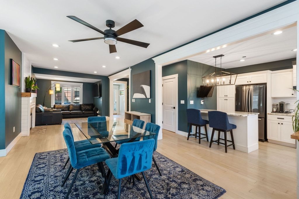 Chandelier, Dining room, Interior, Kitchen, Living room, Pendant Lights, Recessed Lighting, Stainless Steel Appliances, Wood Texture Flooring