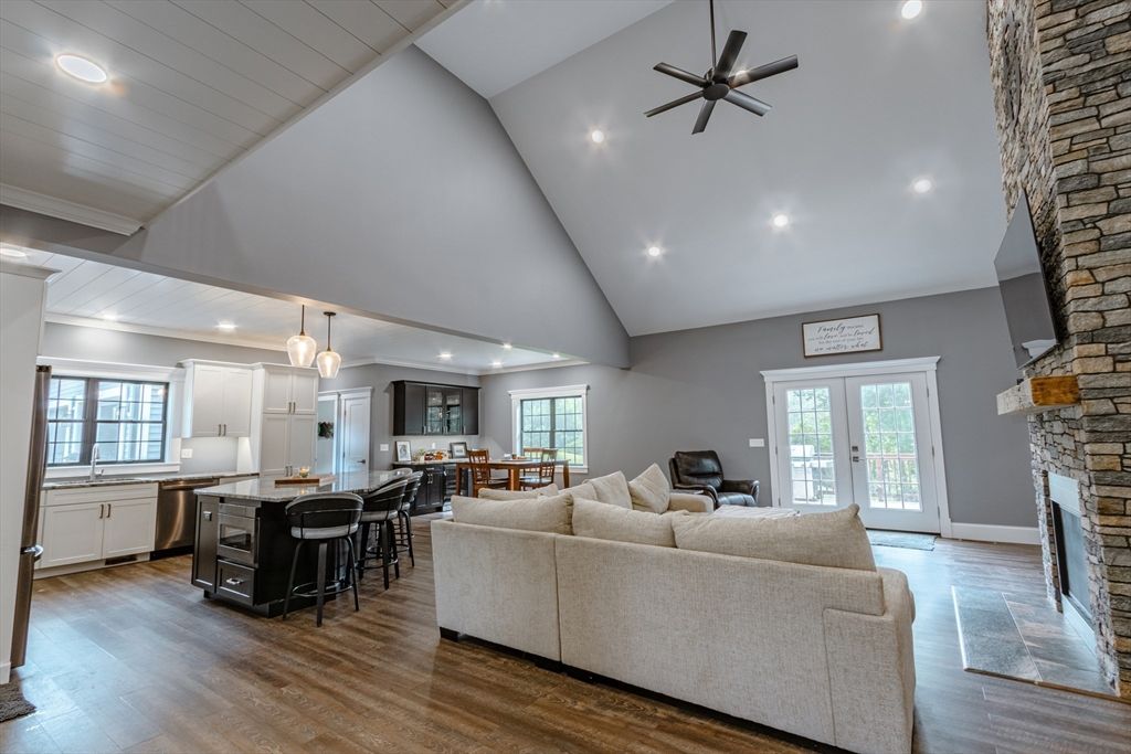 Dining room, Fireplace, Interior, Kitchen, Living room, Pendant Lights, Recessed Lighting, Stone Walls, Wood Texture Flooring