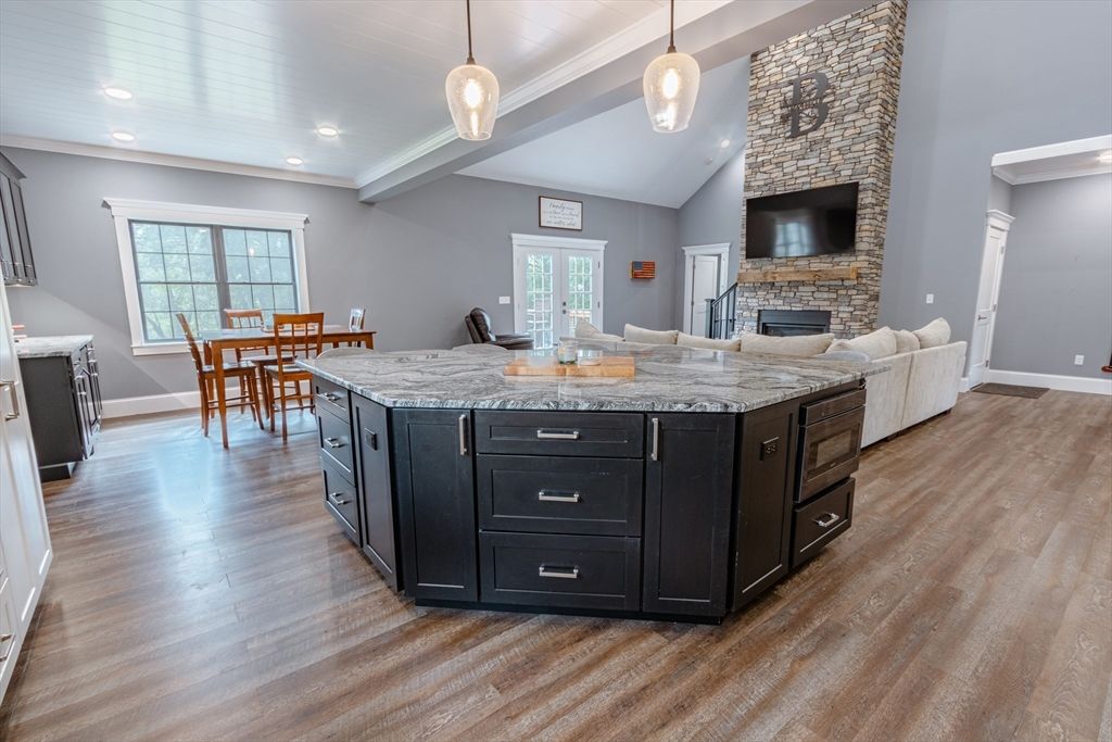 Dining room, Fireplace, Interior, Kitchen, Pendant Lights, Recessed Lighting, Stone Walls, Wood Texture Flooring