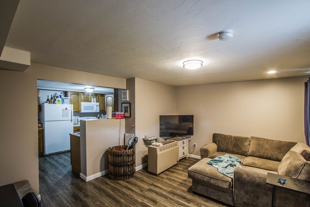 Interior, Kitchen, Living room, Recessed Lighting, Washer, Wood Texture Flooring