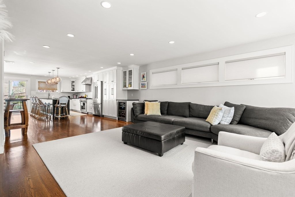 Chandelier, Dining room, Interior, Kitchen, Living room, Pendant Lights, Recessed Lighting, Stainless Steel Appliances, Wood Texture Flooring