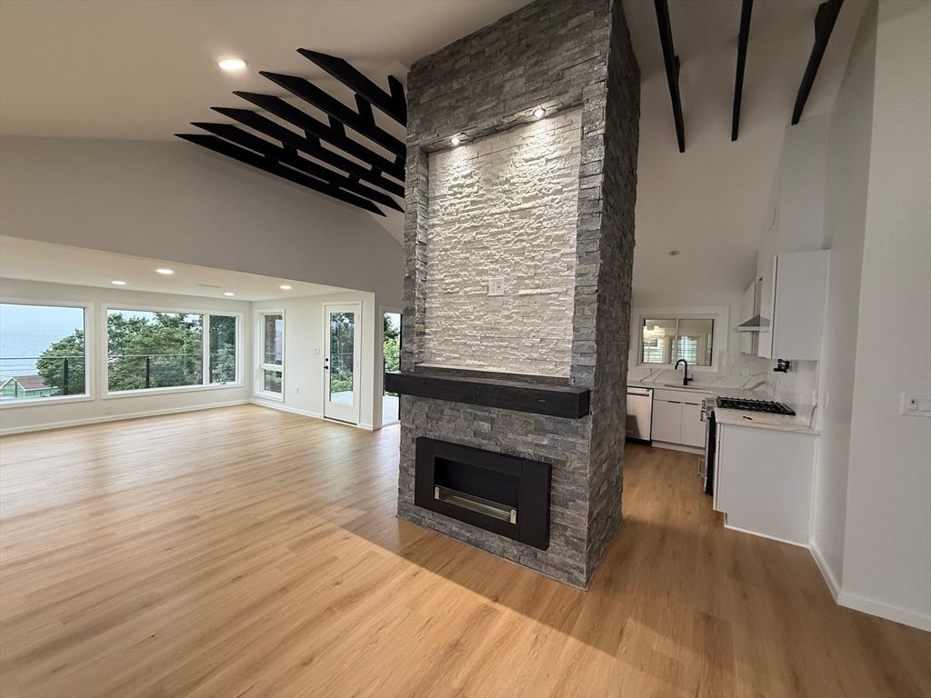 Empty room, Fireplace, Interior, Kitchen, Recessed Lighting, Wood Texture Flooring