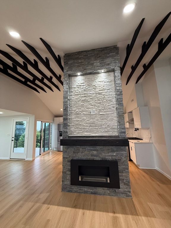 Fireplace, Interior, Recessed Lighting, Stone Walls, Wood Texture Flooring