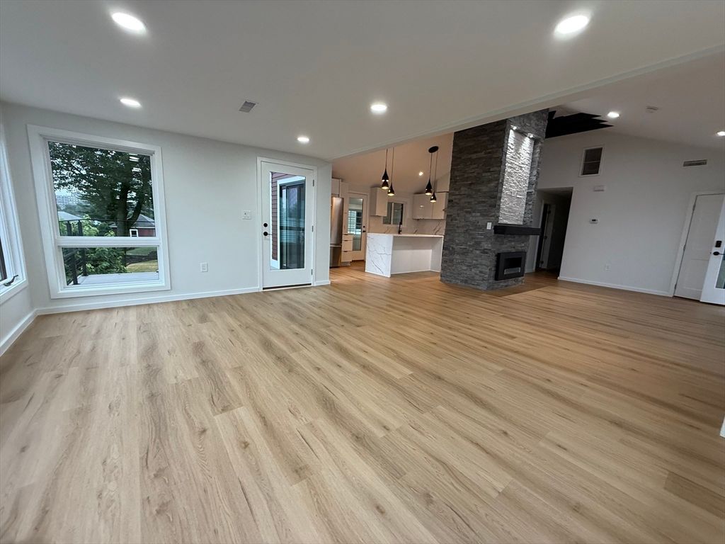 Empty room, Fireplace, Interior, Pendant Lights, Recessed Lighting, Wood Texture Flooring