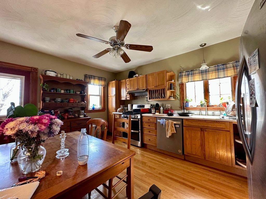 Dining room, Interior, Kitchen, Pendant Lights, Stainless Steel Appliances, Wood Texture Flooring
