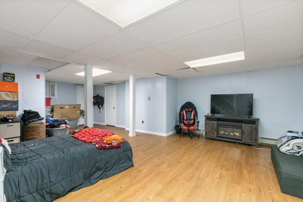 Bedroom, Fireplace, Interior, Recessed Lighting, Wood Texture Flooring
