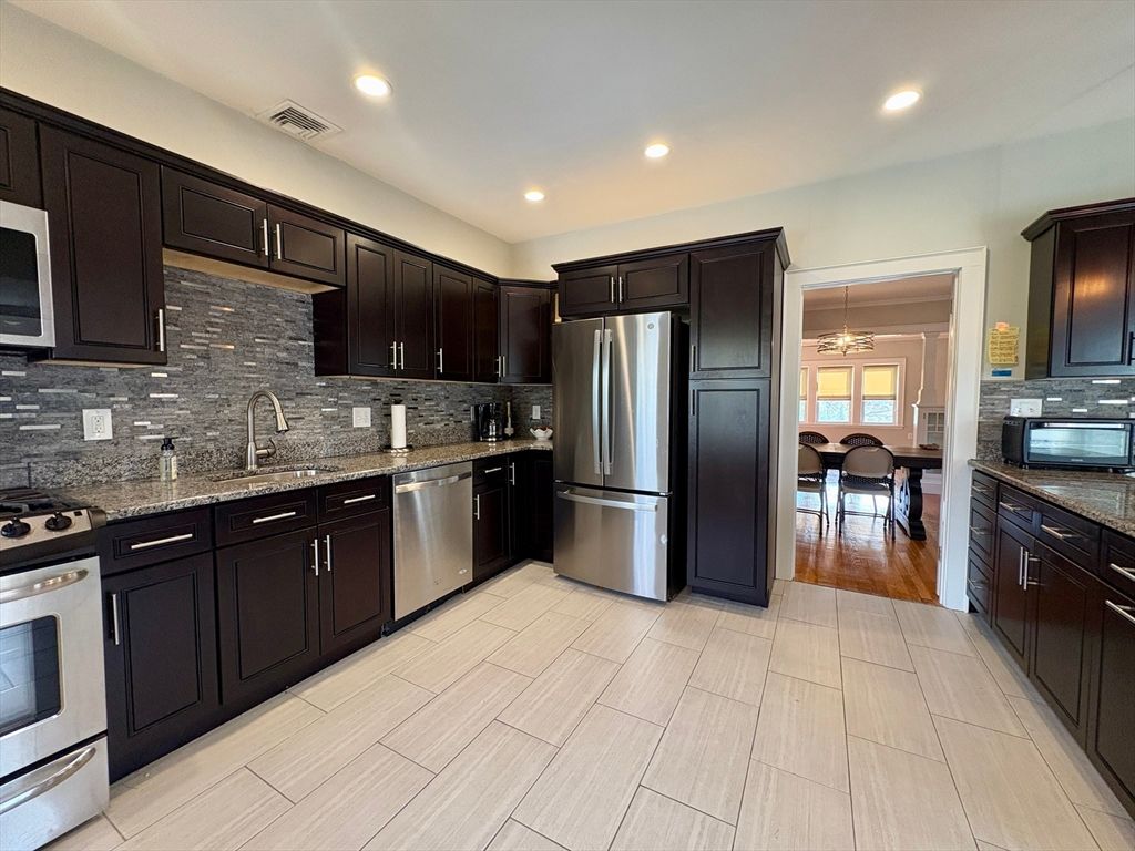 Dining room, Interior, Kitchen, Pendant Lights, Recessed Lighting, Stainless Steel Appliances, Wood Texture Flooring