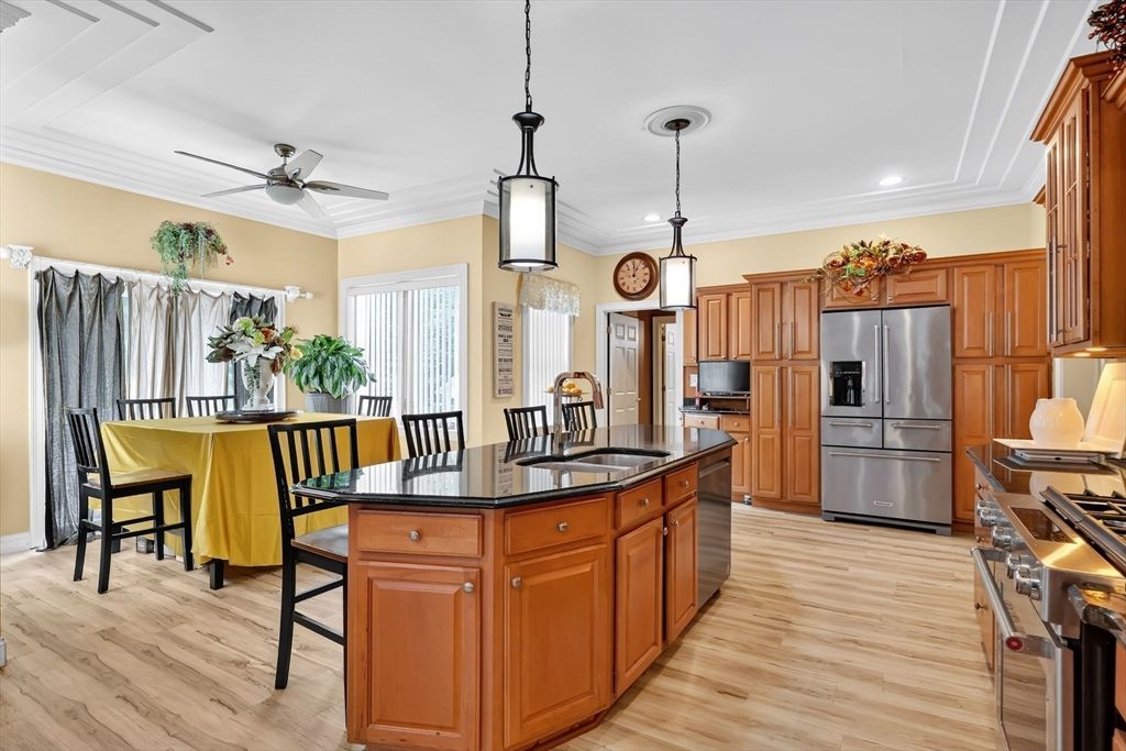 Dining room, Interior, Kitchen, Pendant Lights, Recessed Lighting, Stainless Steel Appliances, Wood Texture Flooring