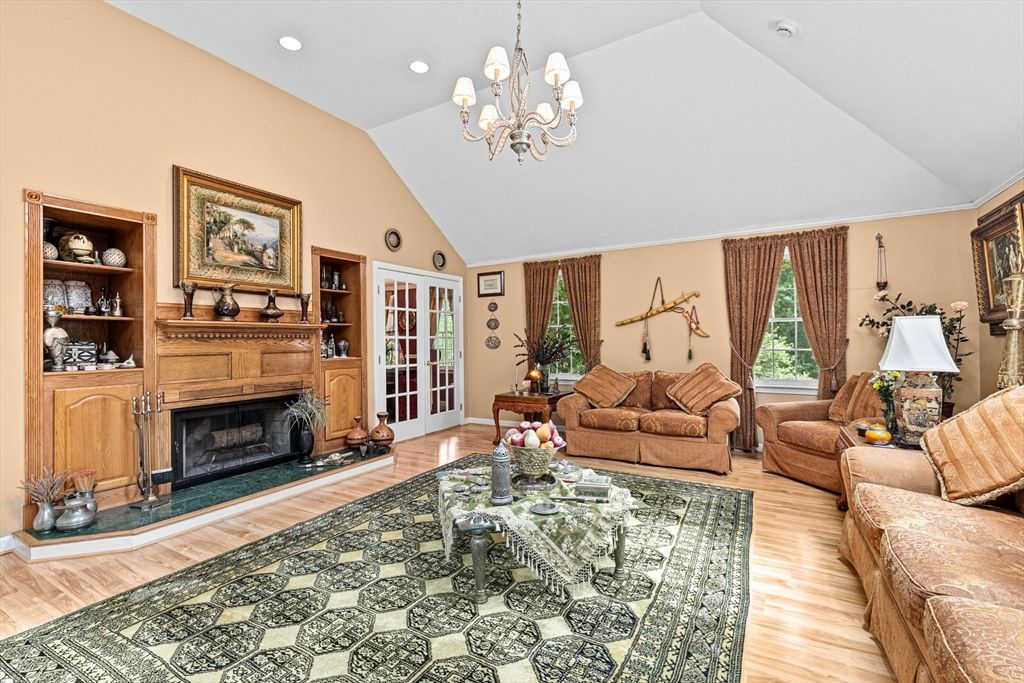 Chandelier, Fireplace, Interior, Living room, Recessed Lighting, Wood Texture Flooring