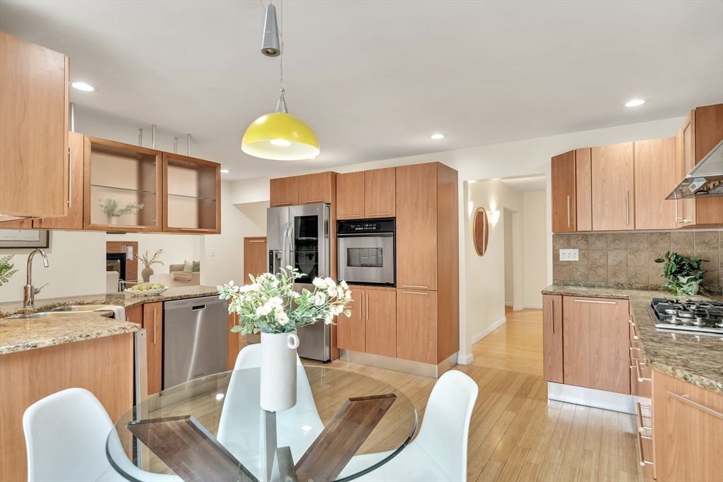 Dining room, Interior, Kitchen, Pendant Lights, Recessed Lighting, Stainless Steel Appliances, Wood Texture Flooring