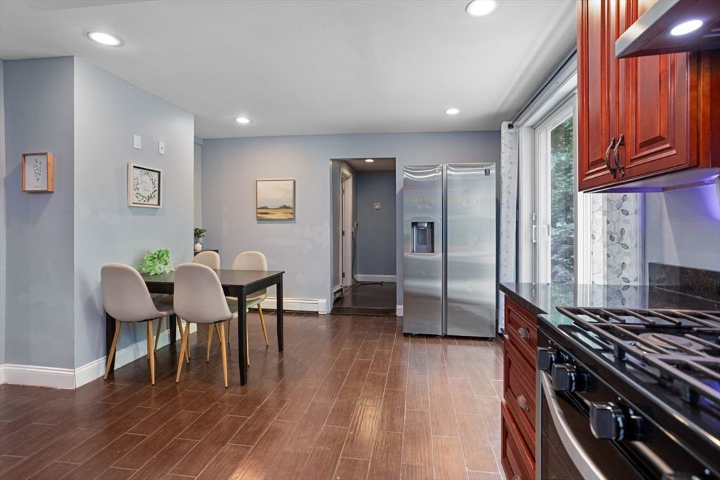 Dining room, Interior, Kitchen, Recessed Lighting, Stainless Steel Appliances, Wood Texture Flooring