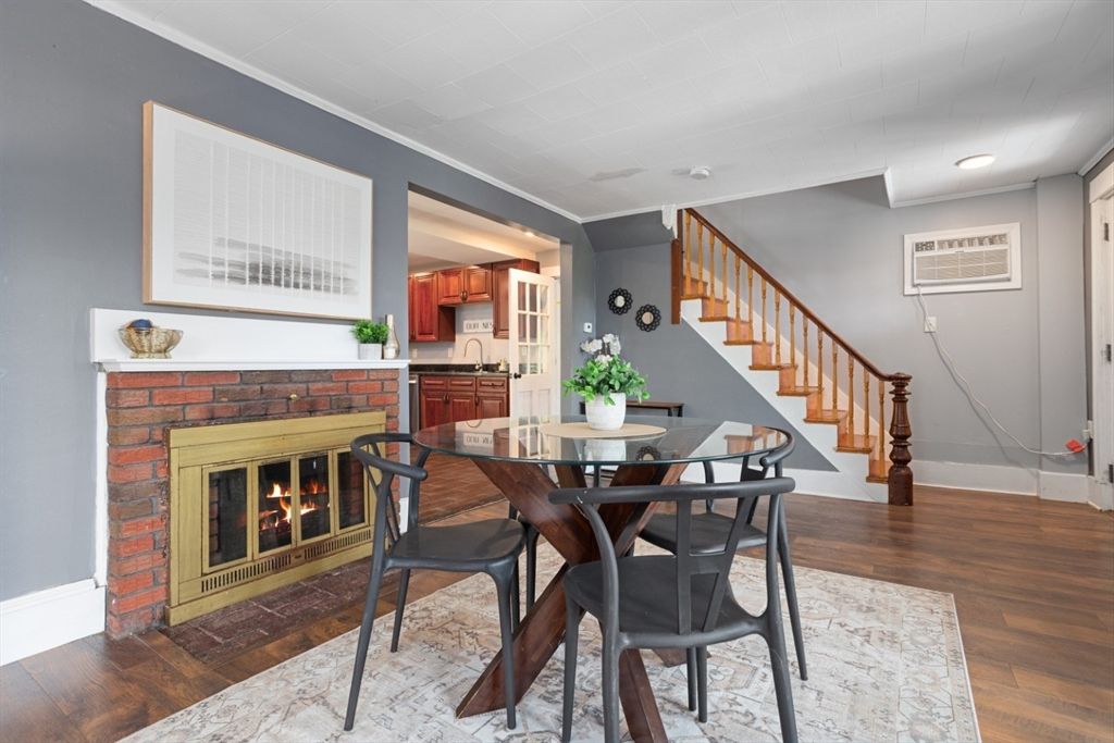 Dining room, Fireplace, Interior, Kitchen, Recessed Lighting, Wood Texture Flooring