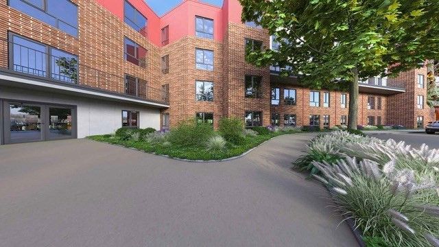 Exterior, Facade, Brick Facade, Condo Building