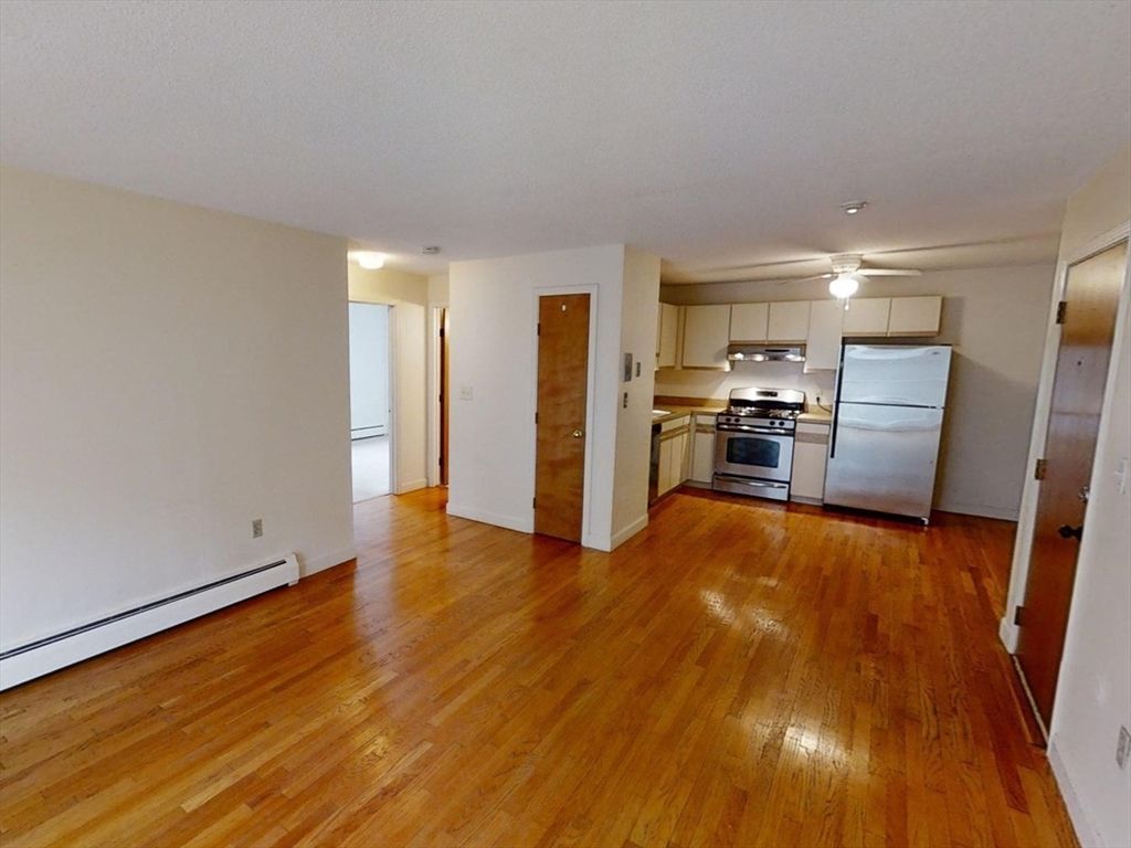 Empty room, Interior, Kitchen, Stainless Steel Appliances, Wood Texture Flooring