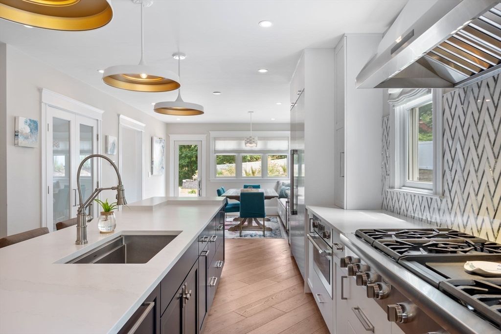 Dining room, Interior, Kitchen, Pendant Lights, Recessed Lighting, Stainless Steel Appliances, Wood Texture Flooring