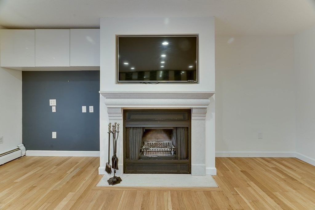Fireplace, Interior, Recessed Lighting, Wood Texture Flooring