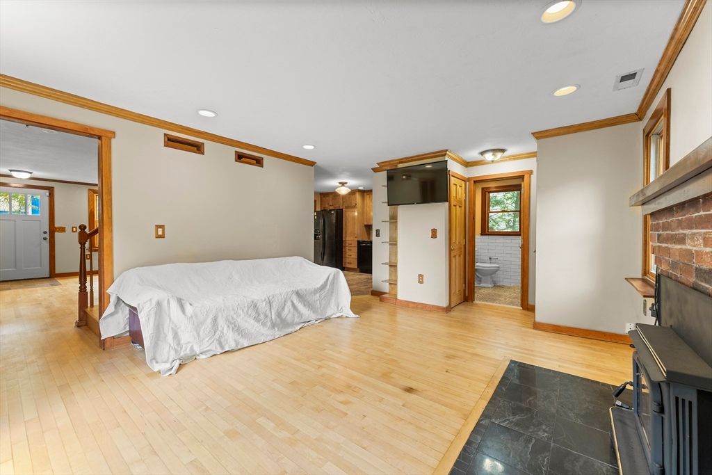 Bedroom, Fireplace, Interior, Recessed Lighting, Wood Texture Flooring