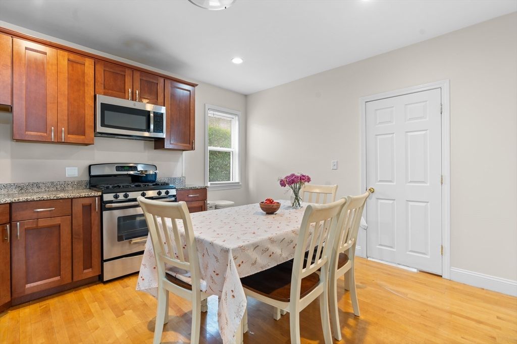 Dining room, Interior, Kitchen, Recessed Lighting, Stainless Steel Appliances, Wood Texture Flooring
