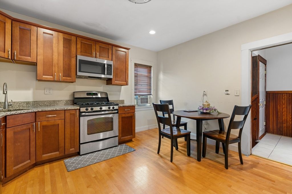 Dining room, Interior, Kitchen, Recessed Lighting, Stainless Steel Appliances, Wood Texture Flooring
