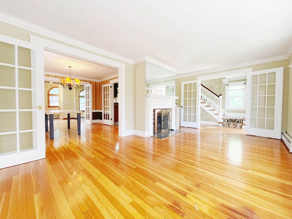 Chandelier, Dining room, Empty room, Fireplace, Interior, Wood Texture Flooring