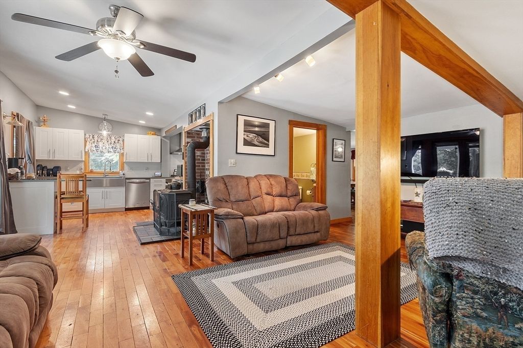 Chandelier, Interior, Kitchen, Living room, Recessed Lighting, Stainless Steel Appliances, Wood Texture Flooring
