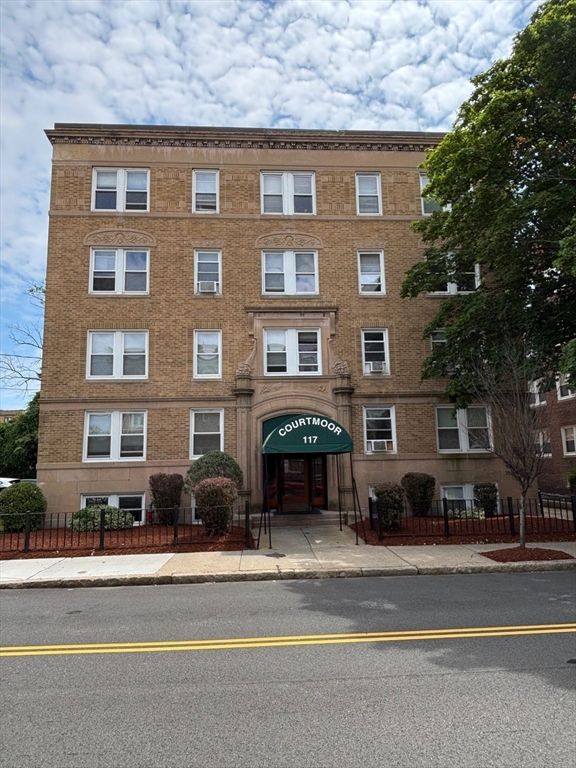 Exterior, Facade, Brick Facade, Condo Building