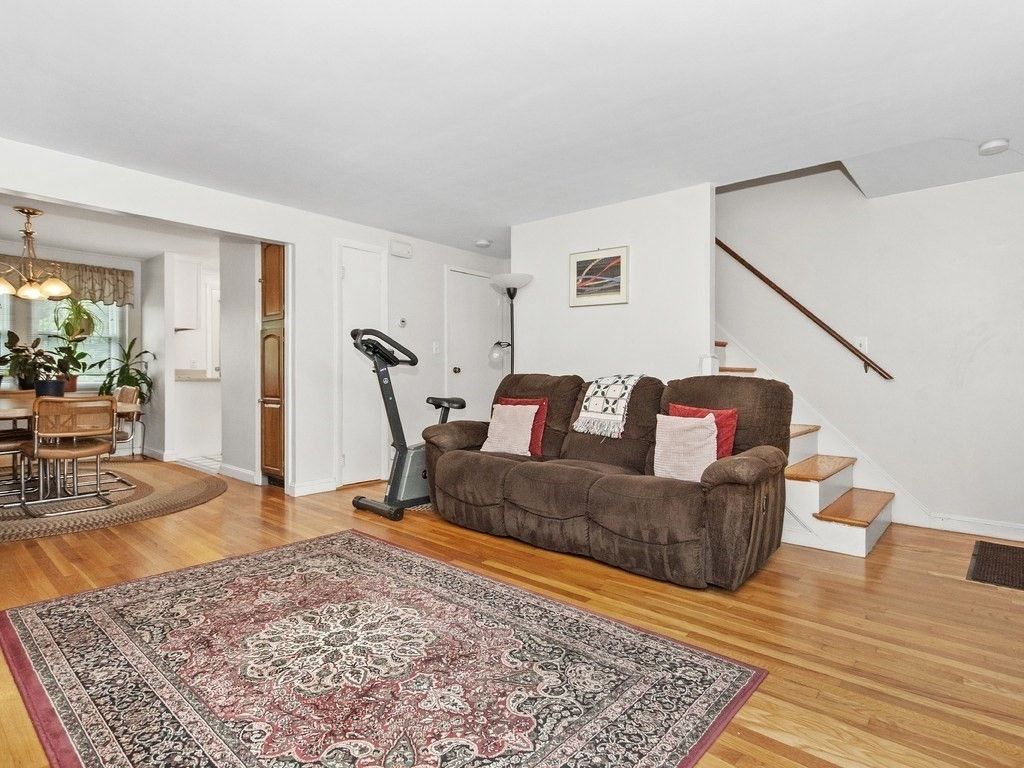 Dining room, Fitness Equipment, Interior, Living room, Pendant Lights, Wood Texture Flooring