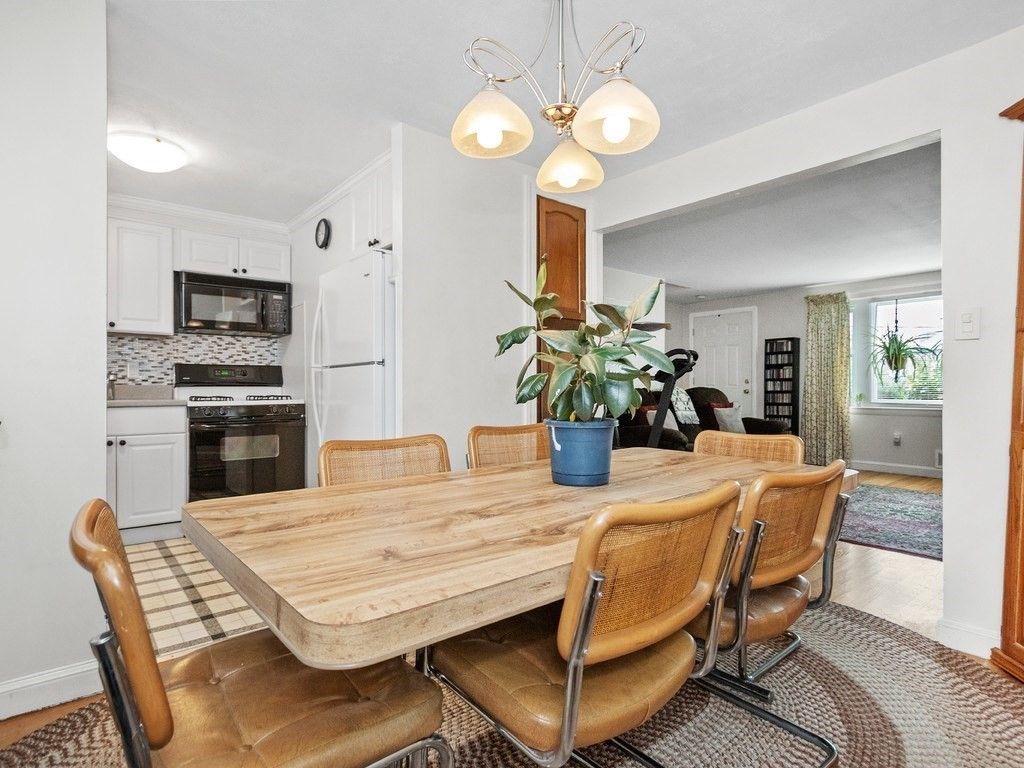 Dining room, Interior, Kitchen, Pendant Lights, Stainless Steel Appliances, Wood Texture Flooring