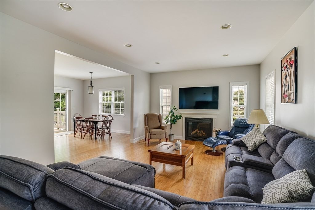 Dining room, Fireplace, Interior, Living room, Recessed Lighting, Wood Texture Flooring