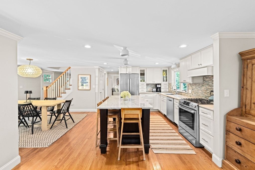 Chandelier, Dining room, Interior, Kitchen, Recessed Lighting, Stainless Steel Appliances, Wood Texture Flooring