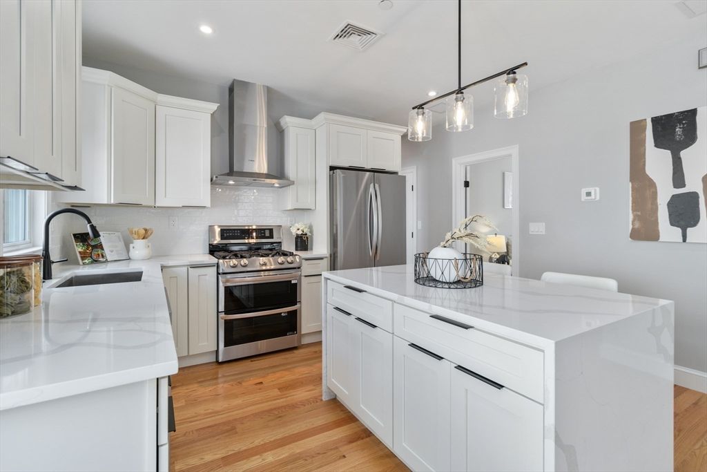 Interior, Kitchen, Pendant Lights, Recessed Lighting, Stainless Steel Appliances, Wood Texture Flooring