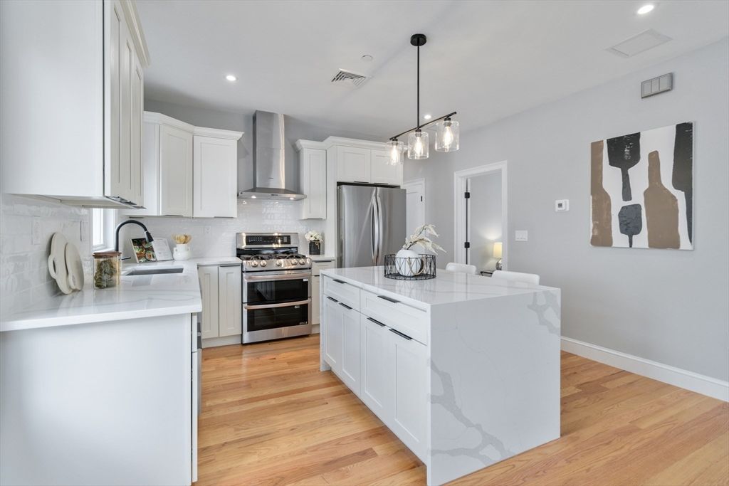Interior, Kitchen, Pendant Lights, Recessed Lighting, Stainless Steel Appliances, Wood Texture Flooring